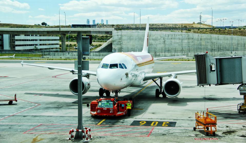 Aircraft parked at an airport gate